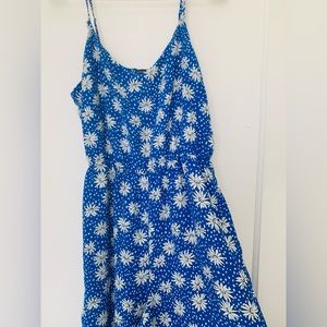 A blue floral romper from Skies Are Blue